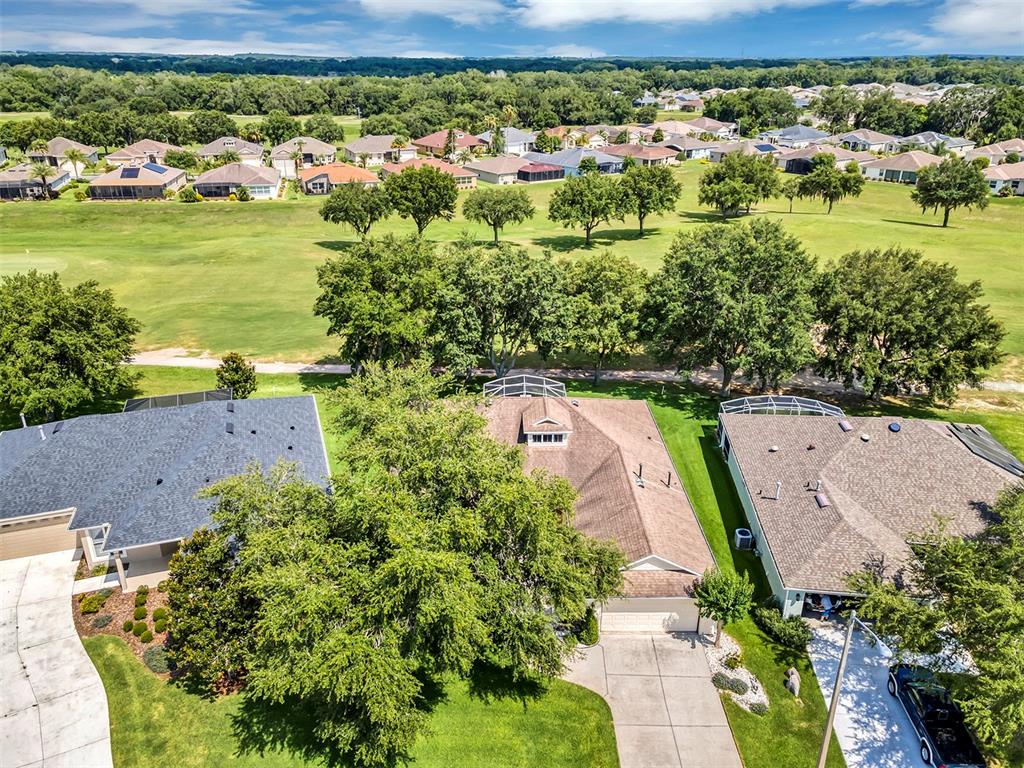 an aerial view of a house with a garden