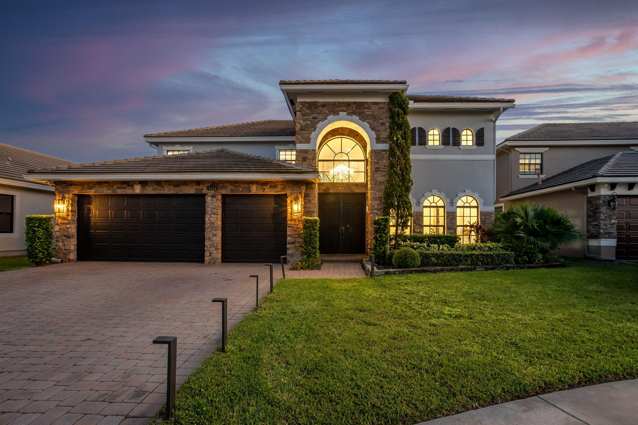 a front view of a house having yard