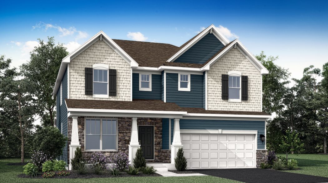 a front view of a house with garage