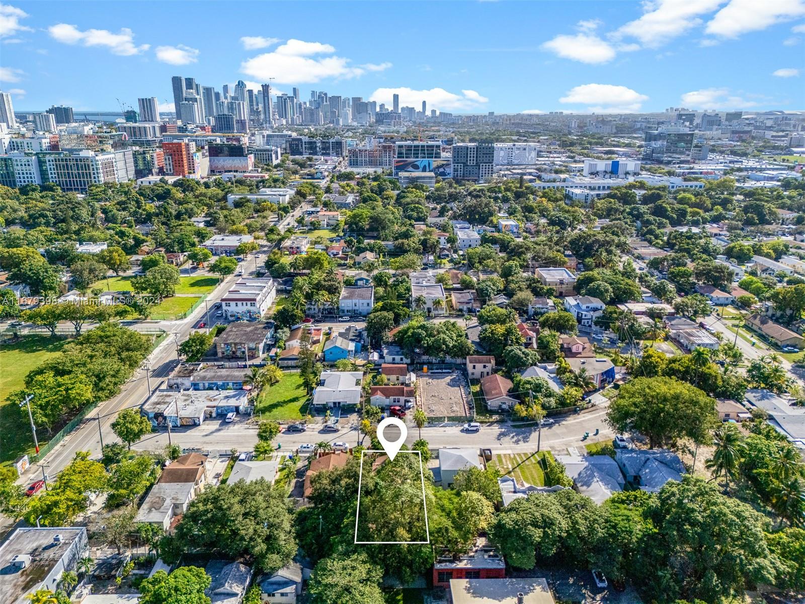 an aerial view of a city with lots of residential buildings