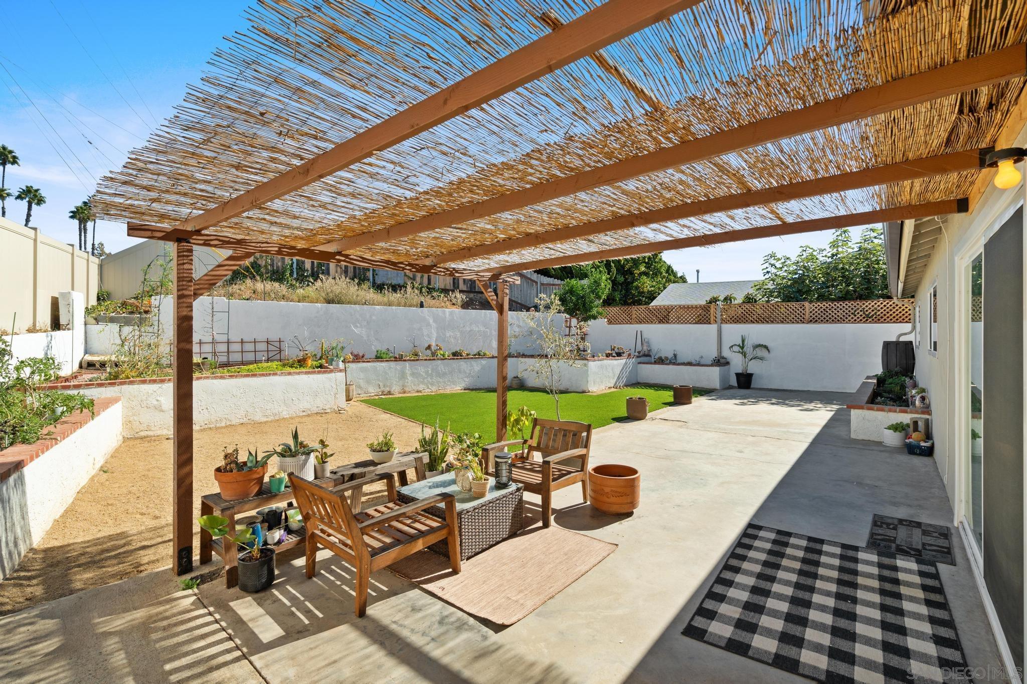 a view of swimming pool with a patio