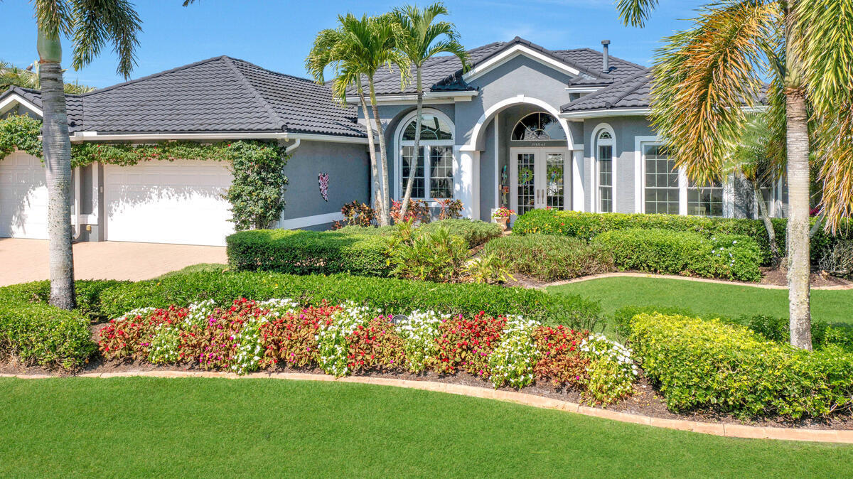 front view of a house with a yard