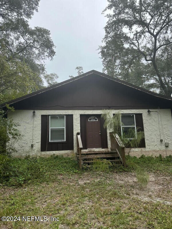 a front view of house with yard