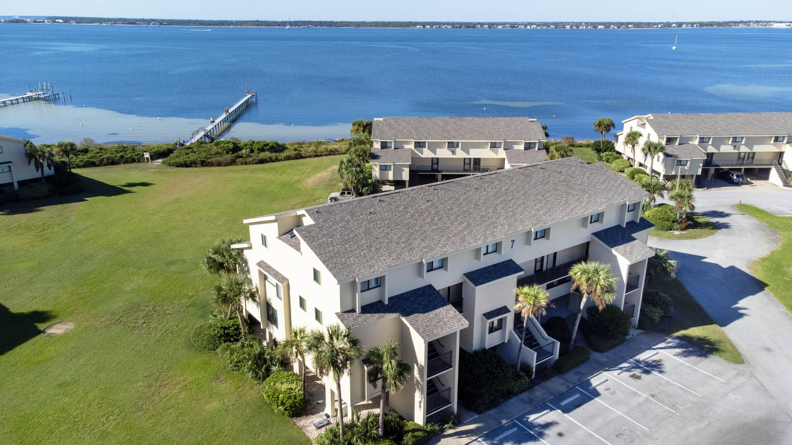 a view of a house with outdoor space and lake view