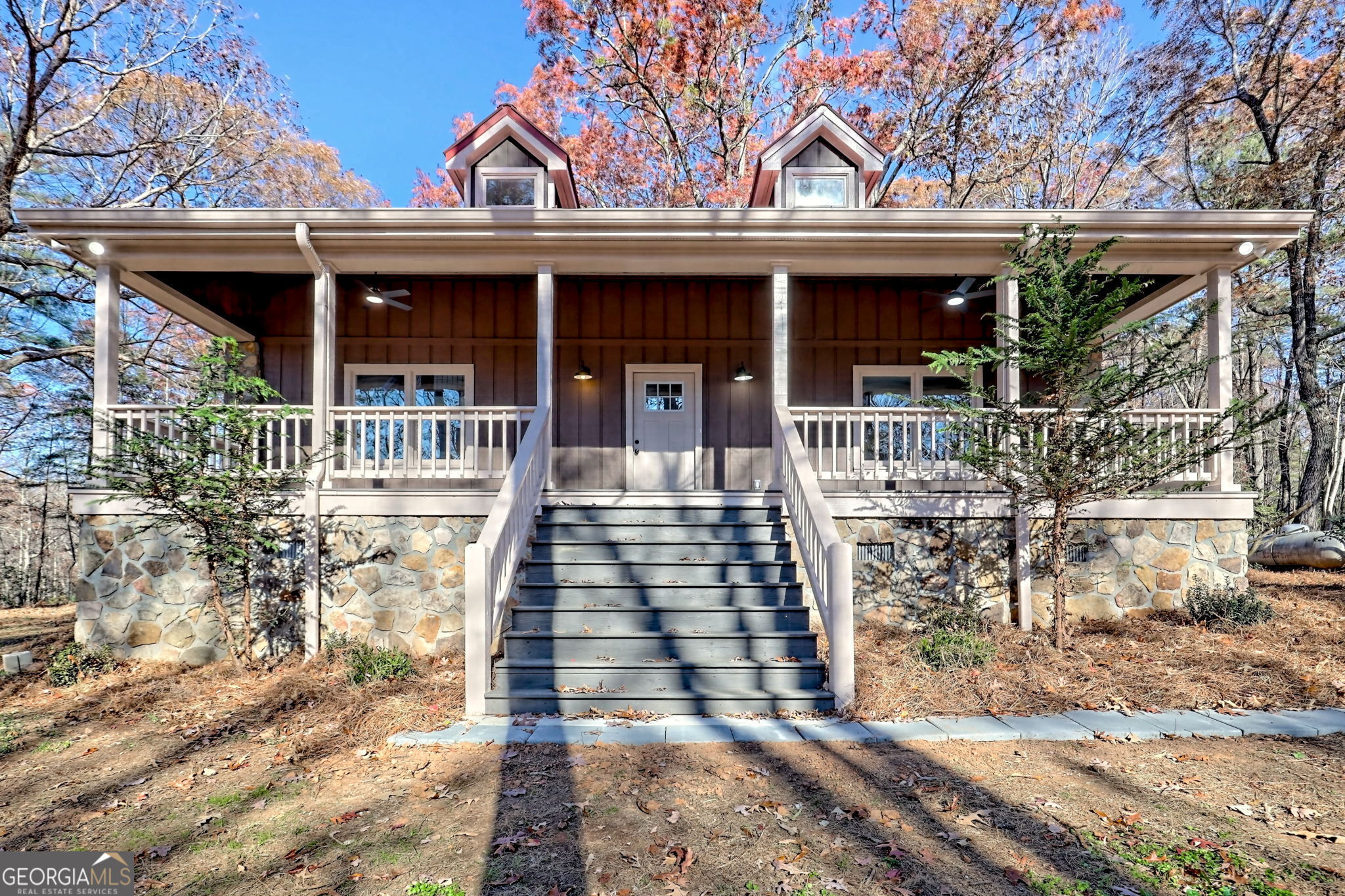 a front view of a house with a porch