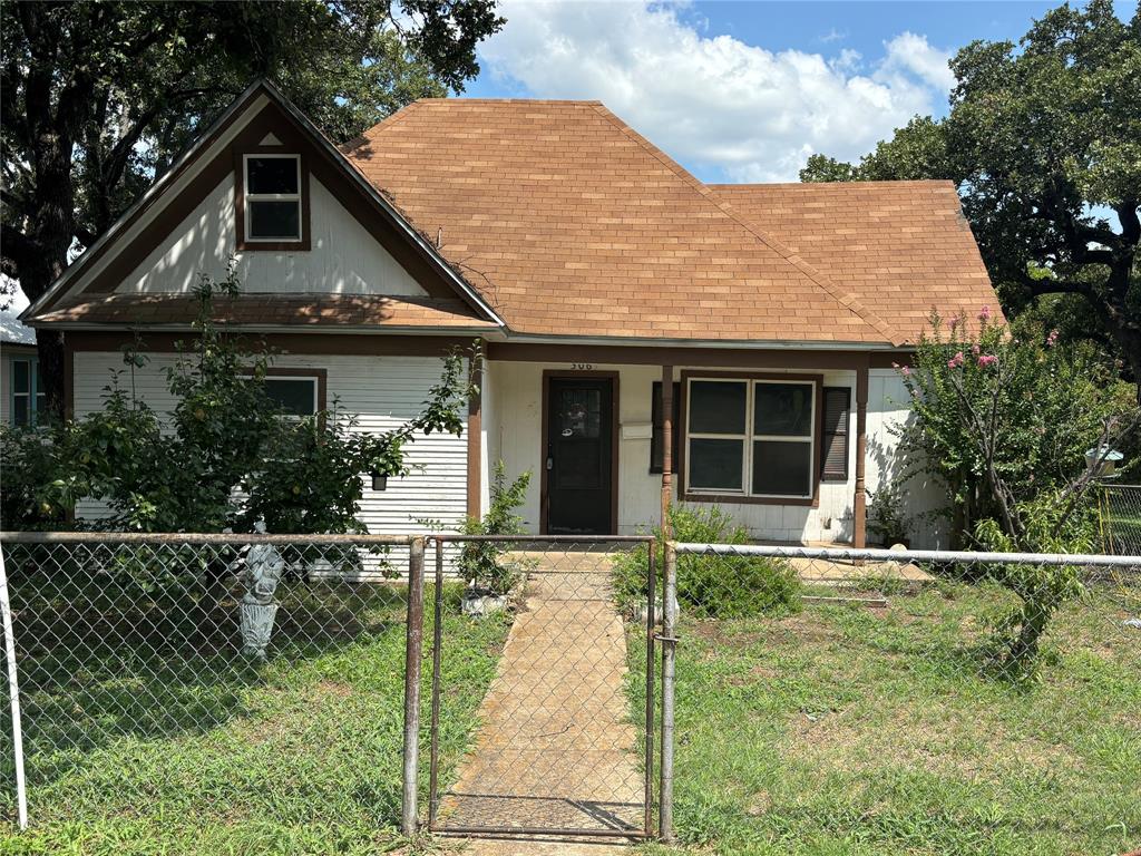 a front view of house with yard