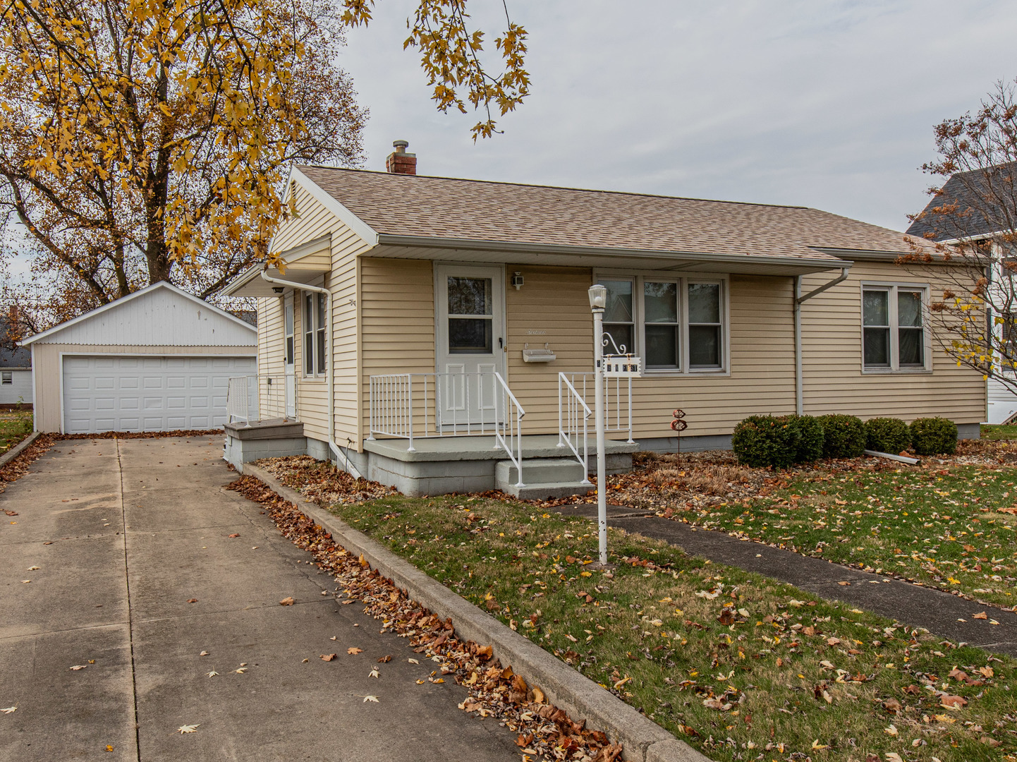 front view of a house with a yard