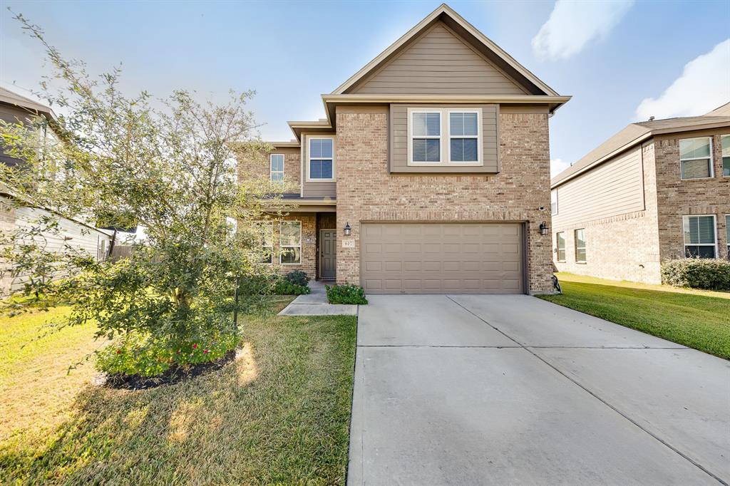 Welcome to this stunning home, where timeless elegance meets modern comfort! Its charming brick facade, rich in character and durability, instantly sets a warm and welcoming tone. This classic exterior not only exudes curb appeal but also promises low maintenance and lasting beauty.