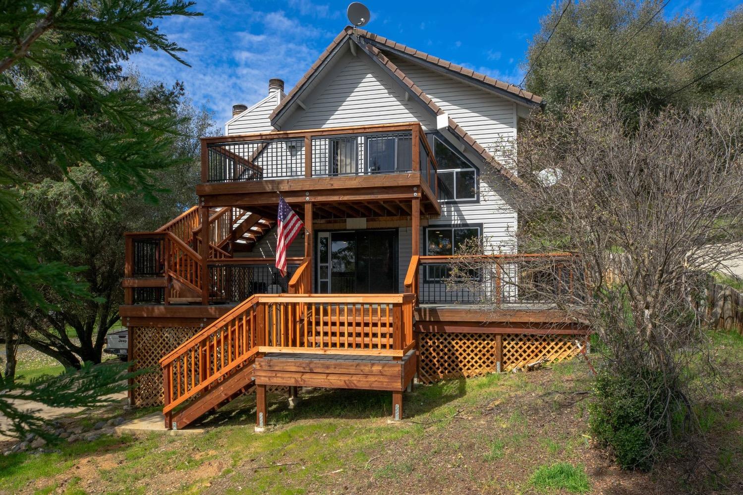 a view of front of house with a yard