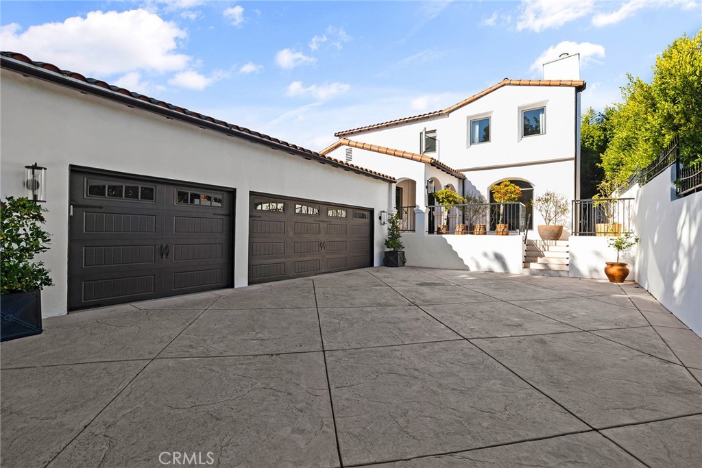 a front view of a house with a garage