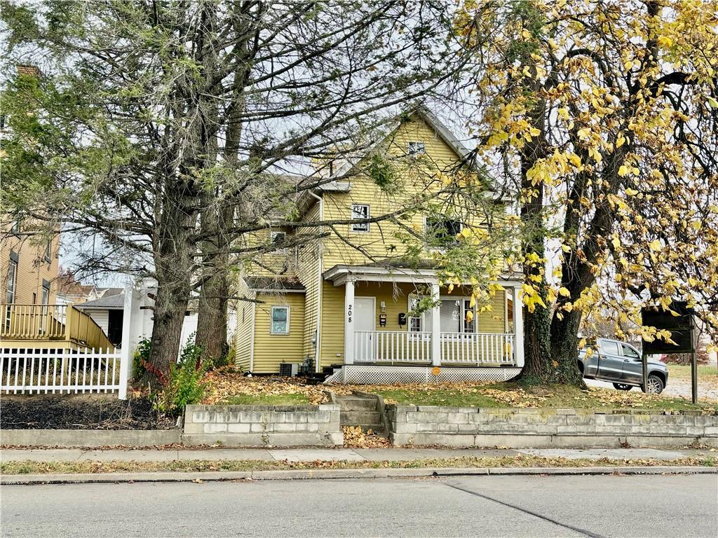 front view of a house with a street