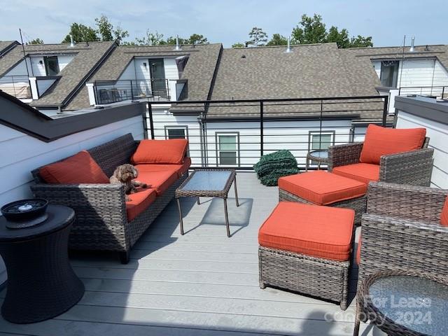 an outdoor sitting area with a couch