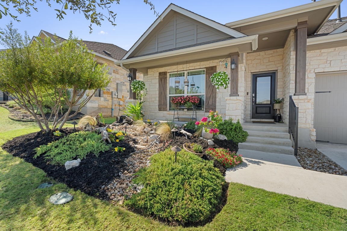 Very nice landscaping and front porch.