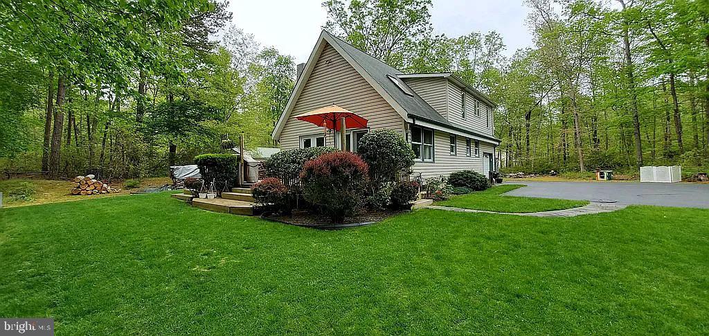 a house view with a garden space