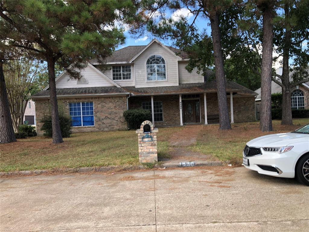 a front view of a house with a garage