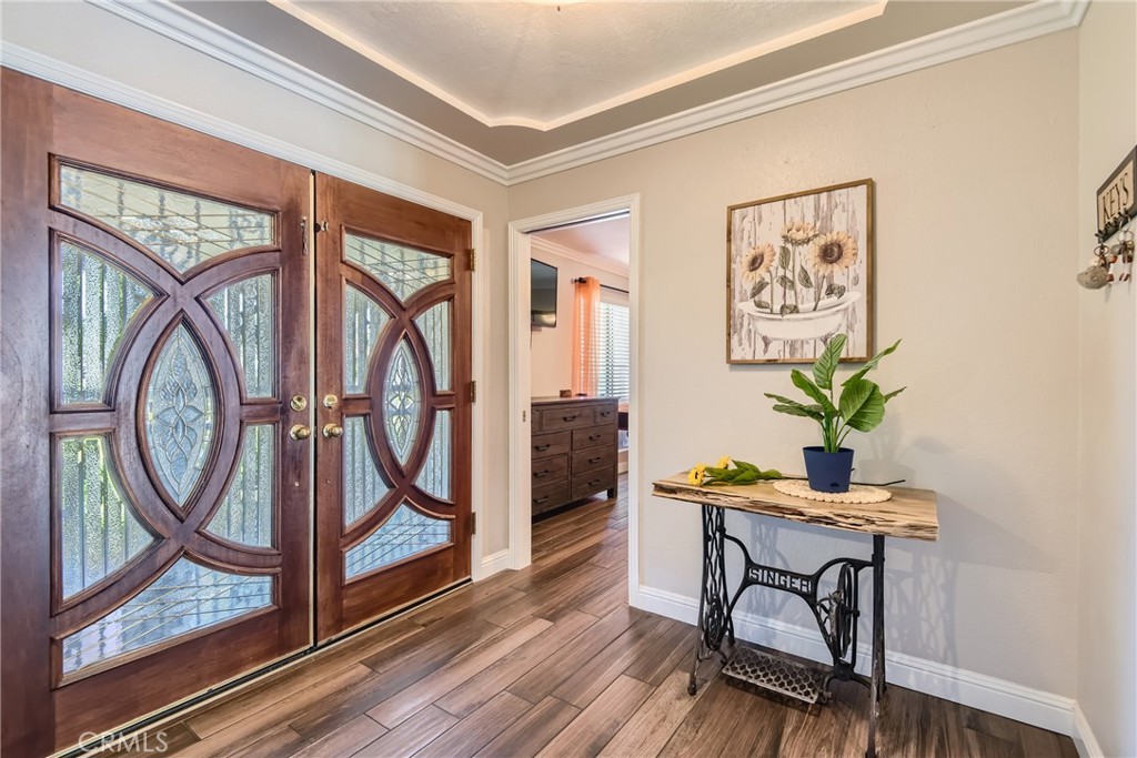 a workspace with furniture entryway and a window