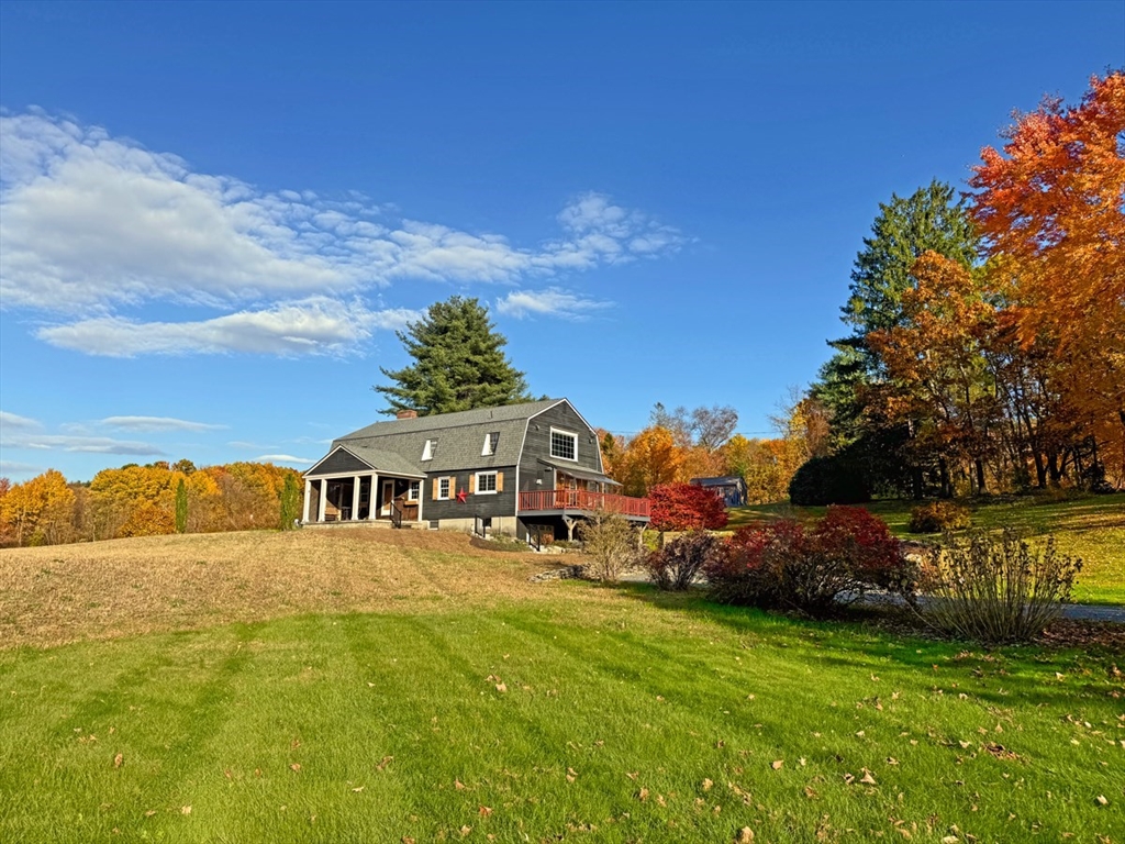 a view of a house with a big yard