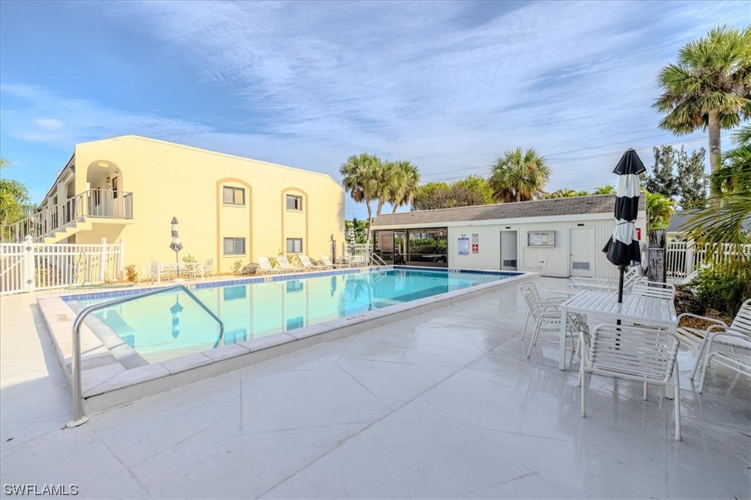 a view of a house with a swimming pool