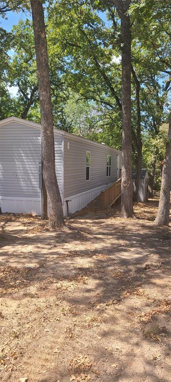 a view of a backyard of a house