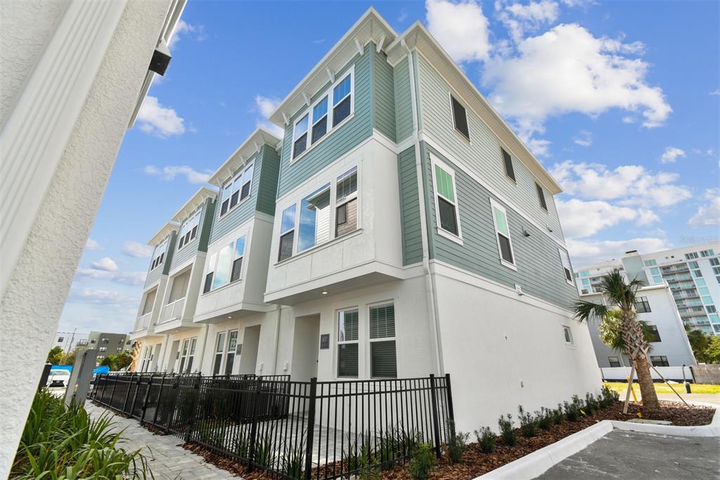 a front view of a multi story residential apartment building