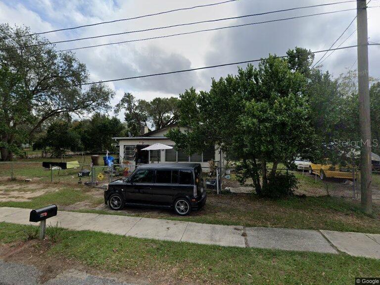 a car parked in front of a house