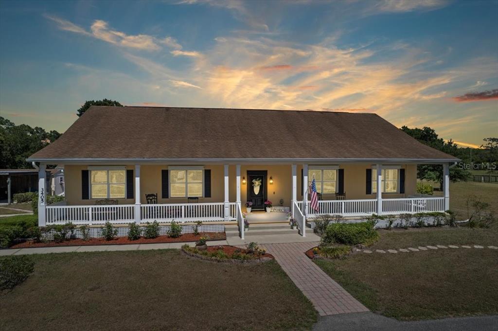 front view of house with a yard