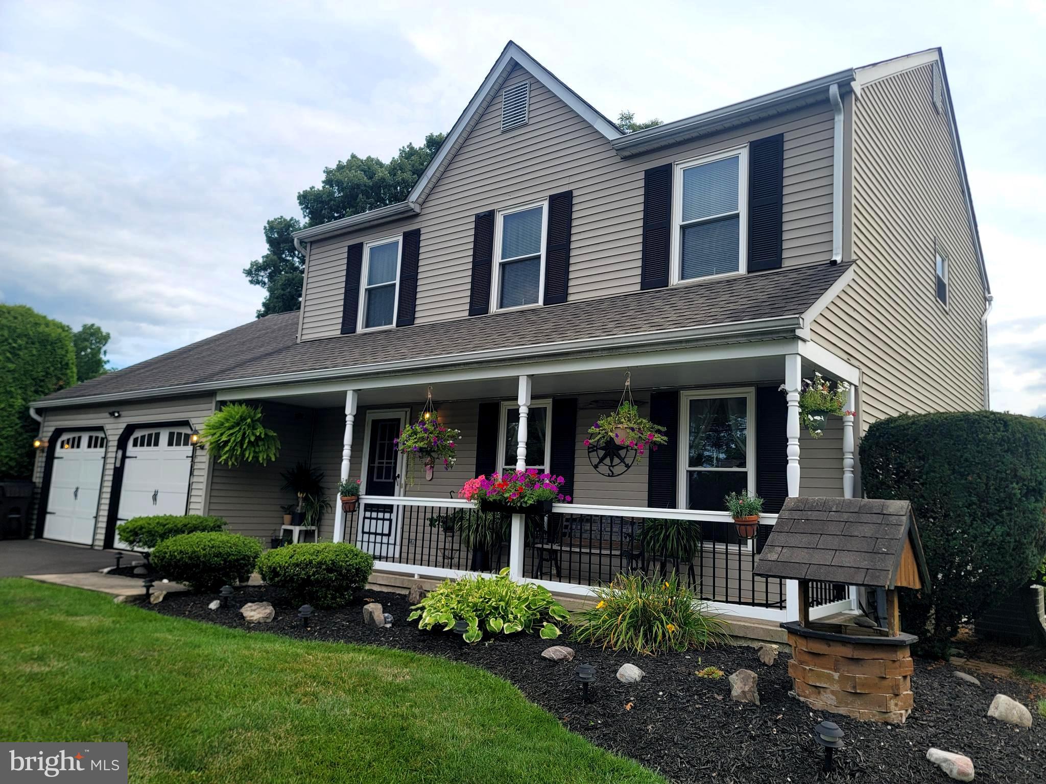 a house view with a garden space