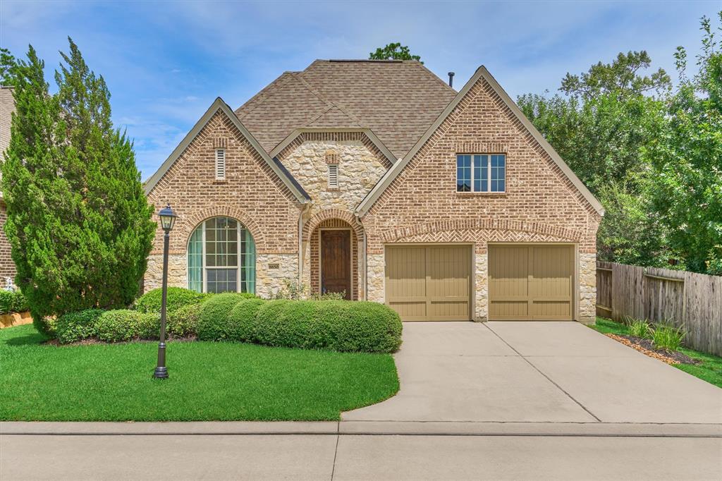 Welcome home to this beautiful Darling built home located upfront in The Woodlands. The property features over 3400 sq/ft of space with 2 bedrooms on the main floor.