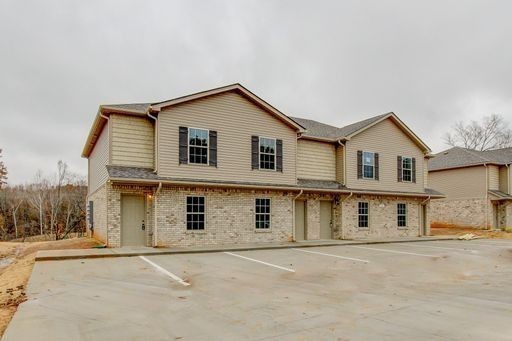 front view of a house with a street