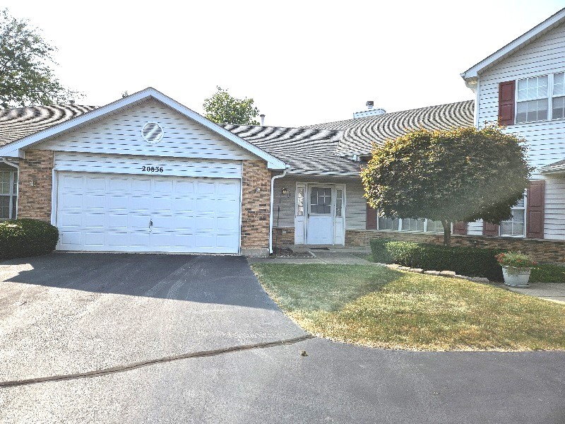 a front view of house with yard