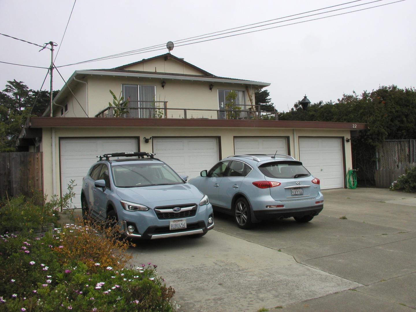 a car parked in front of a house