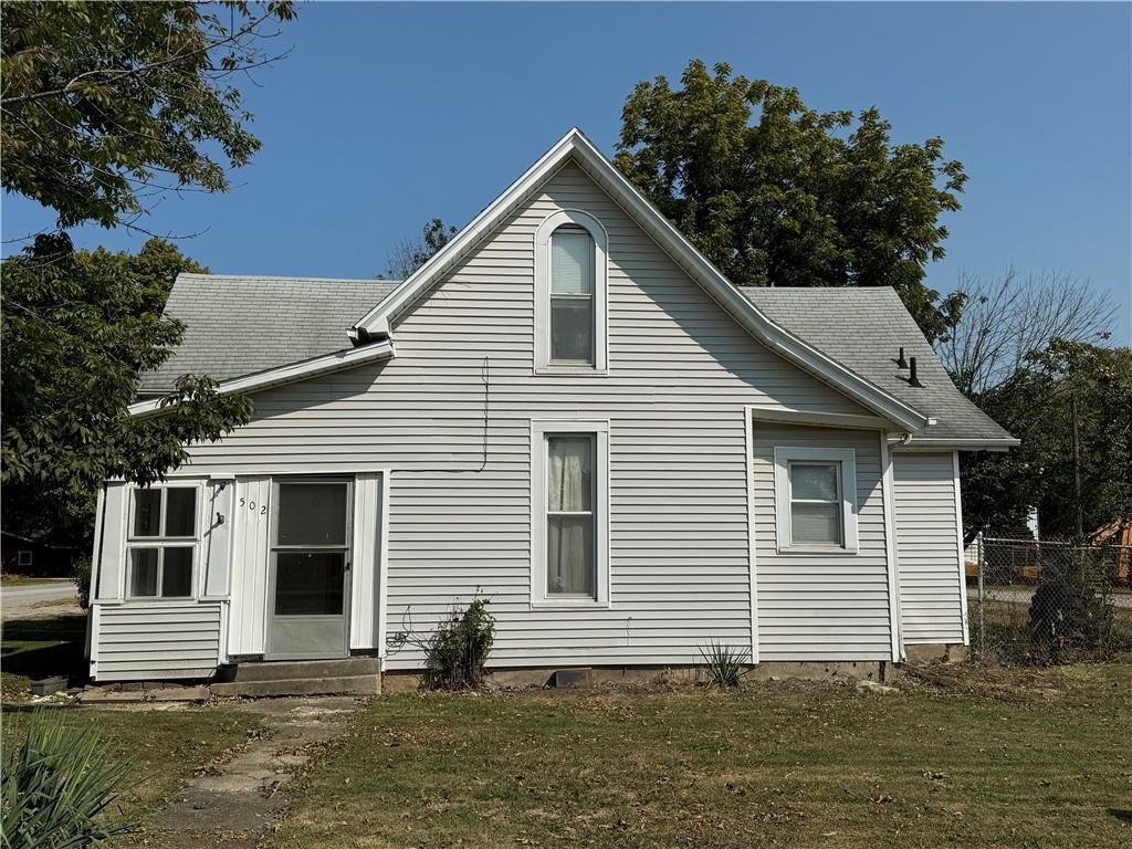 a front view of a house with garage