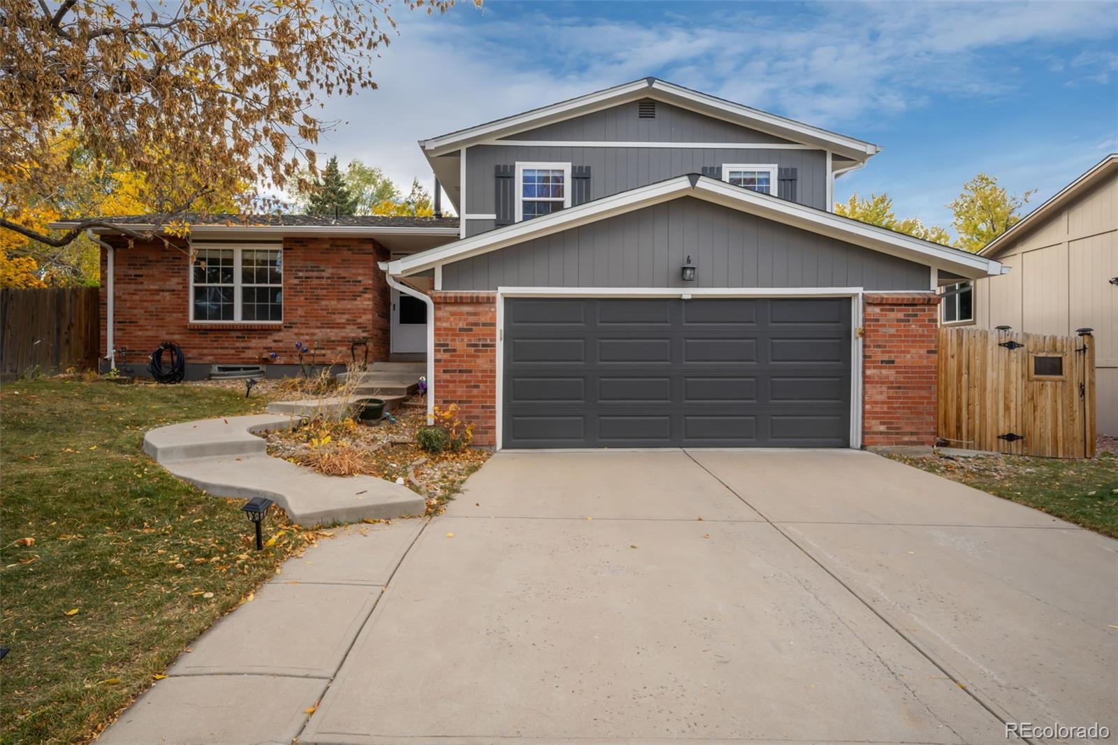 a view of house and outdoor space with yard