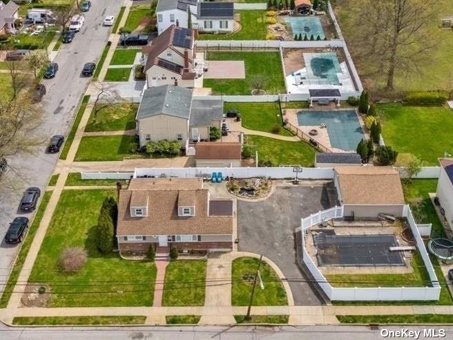 an aerial view of a house with a garden