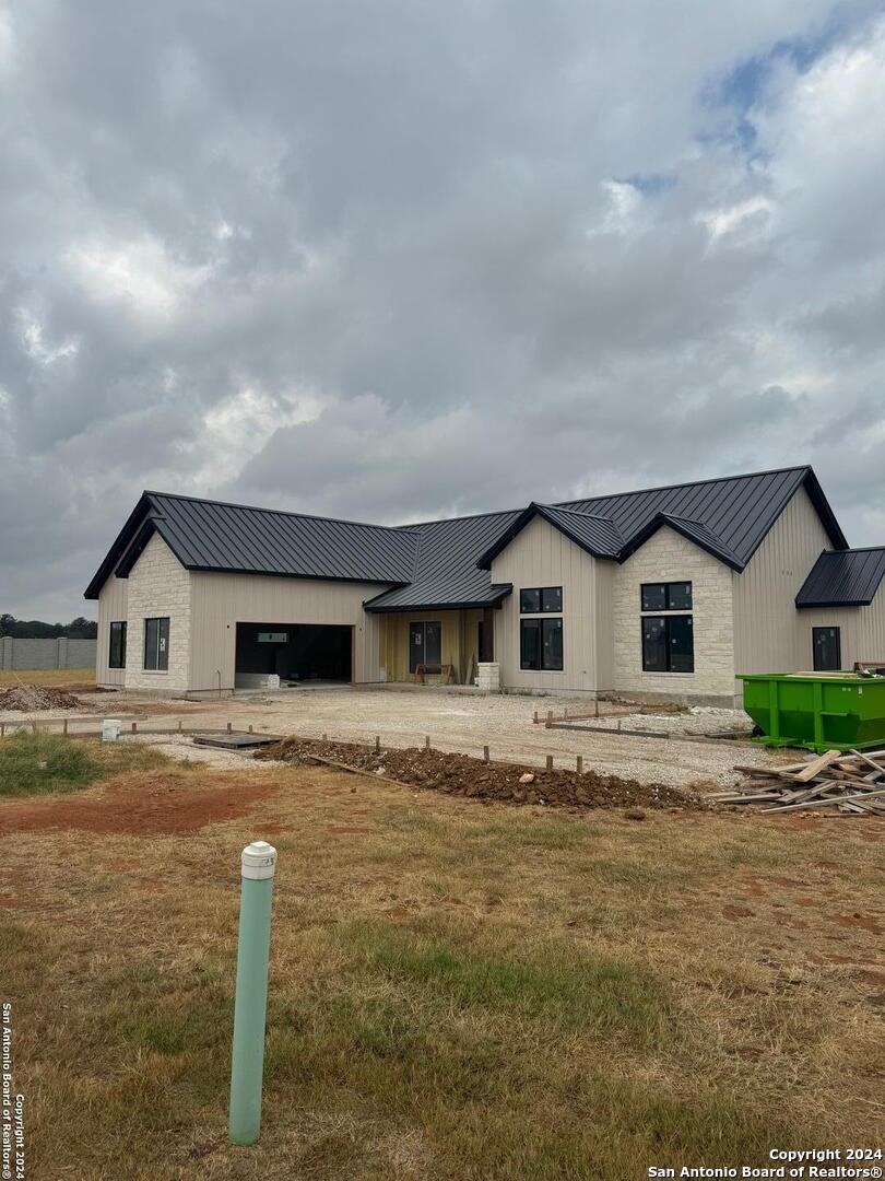 a house with trees in the background