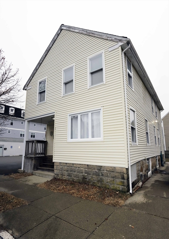 a view of a house with a garage