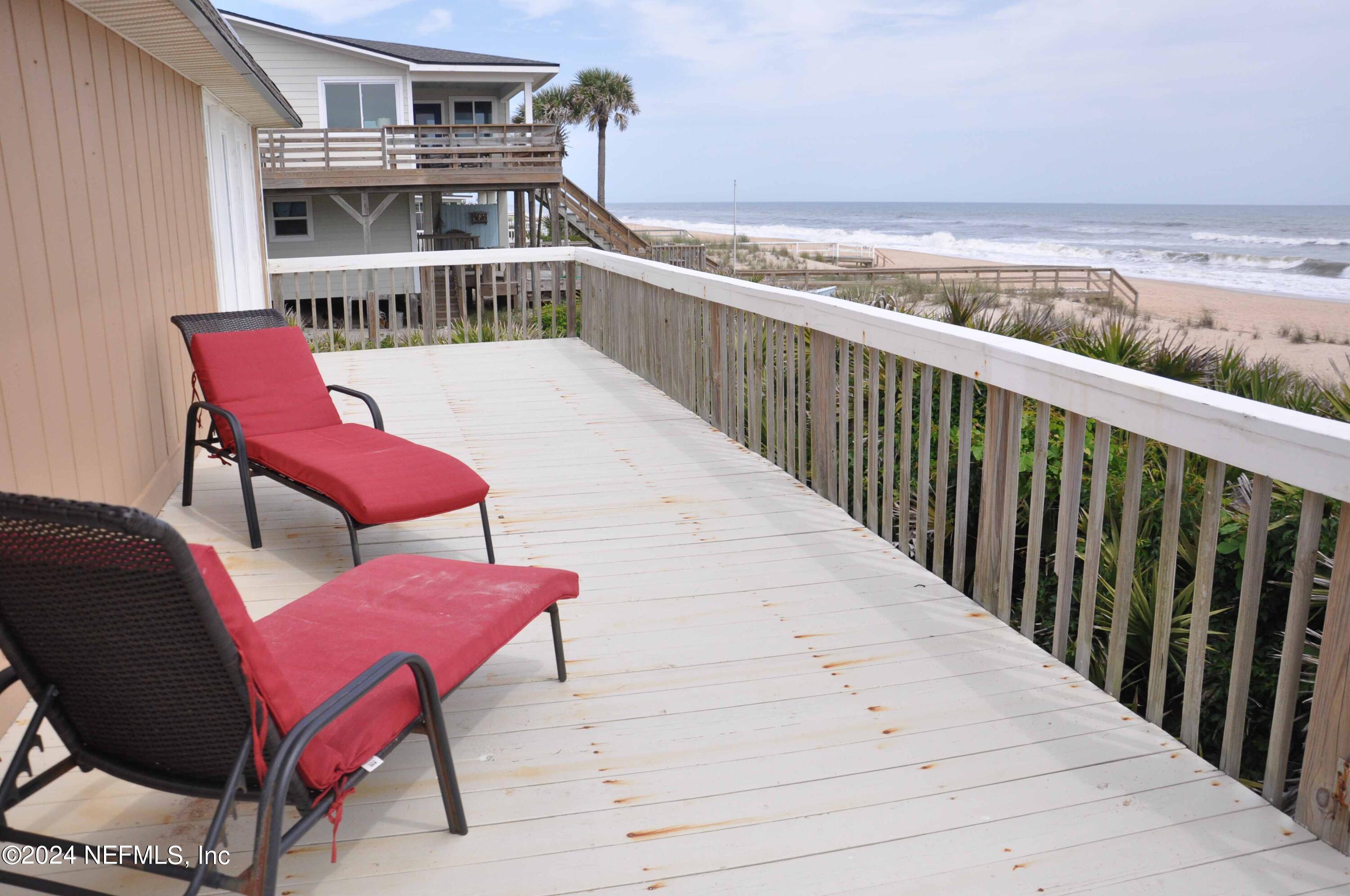 a view of a chairs on the roof deck