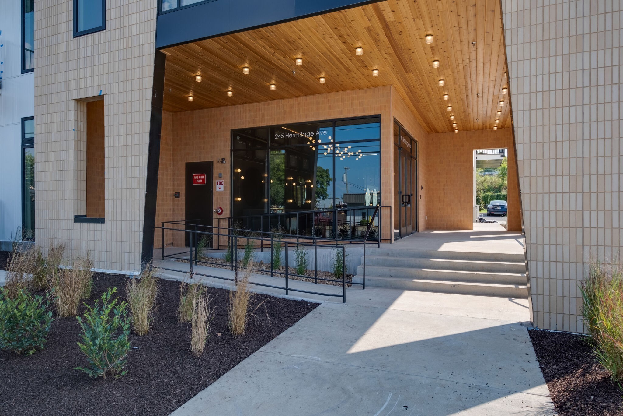 a lobby with furniture and window