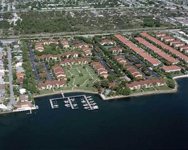 an aerial view of residential house with outdoor space and parking