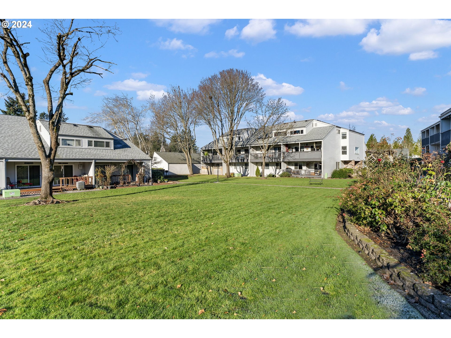 a view of a house with a big yard