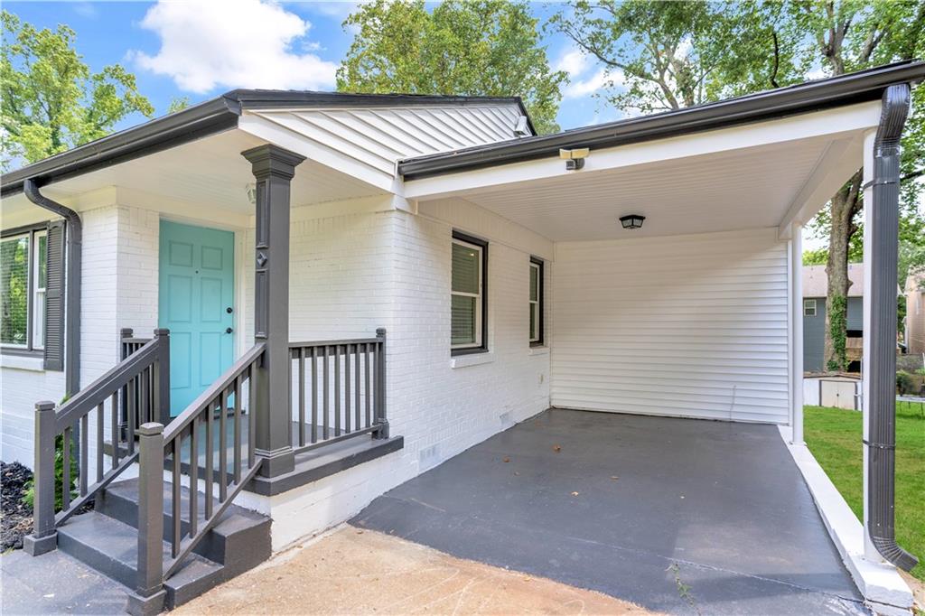 a view of a house with porch and wooden floor