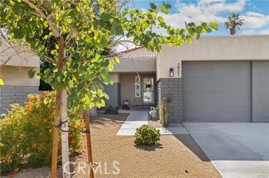 a house view with a outdoor space