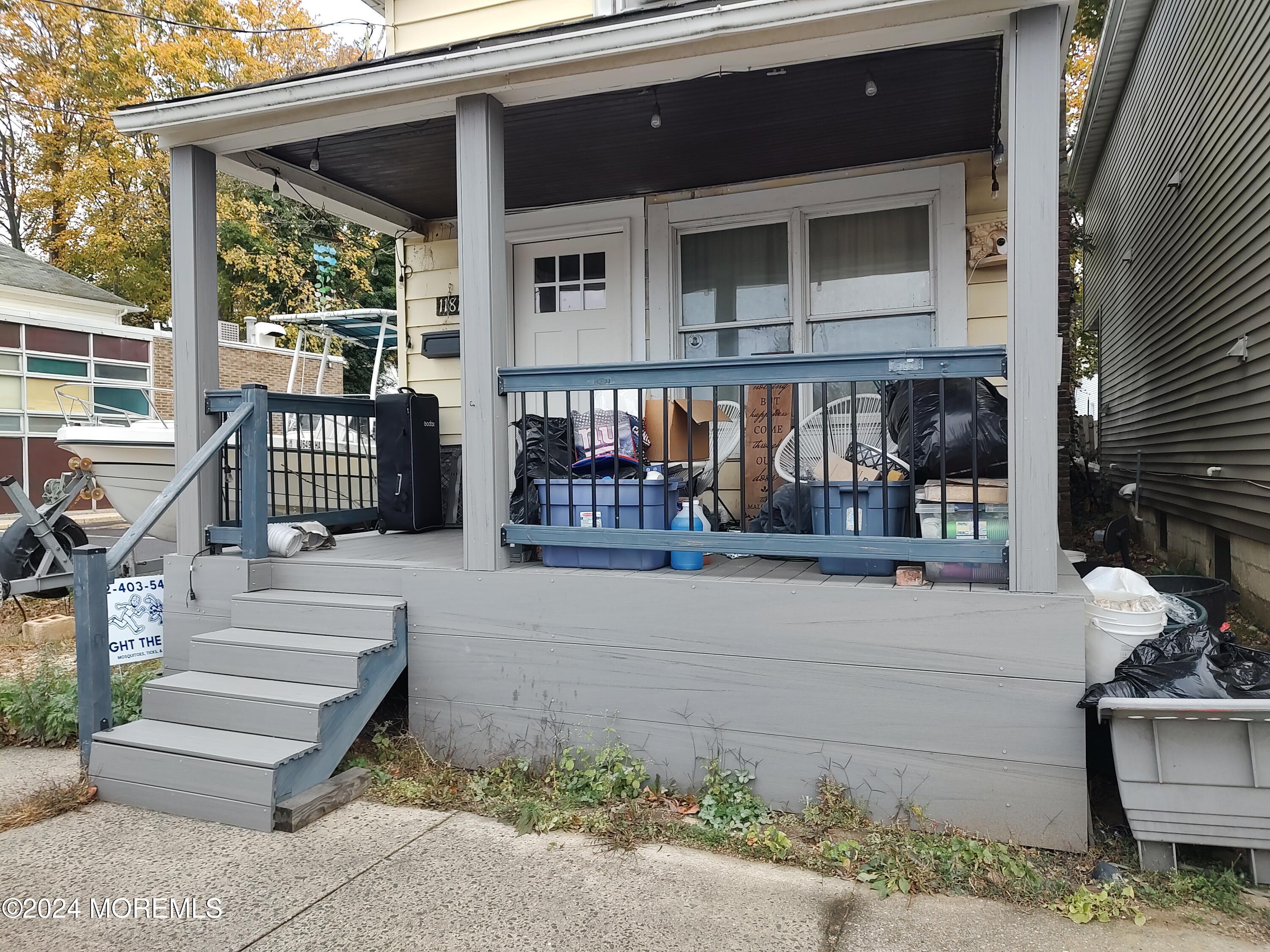 a front view of a house with outdoor space