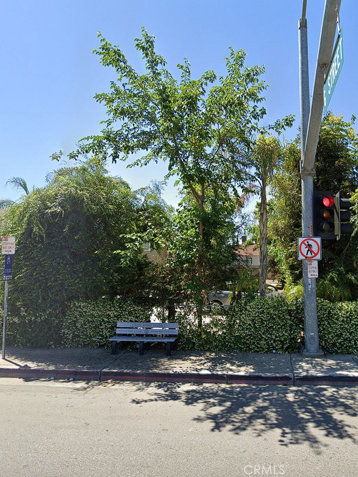 a view of street along with trees