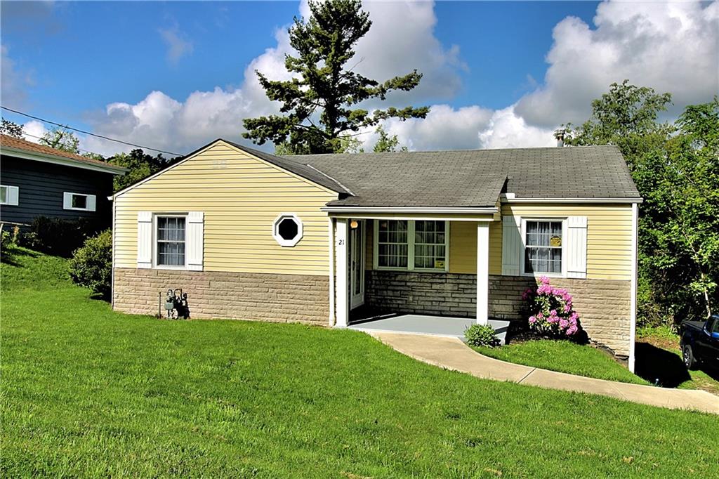 a front view of house with yard