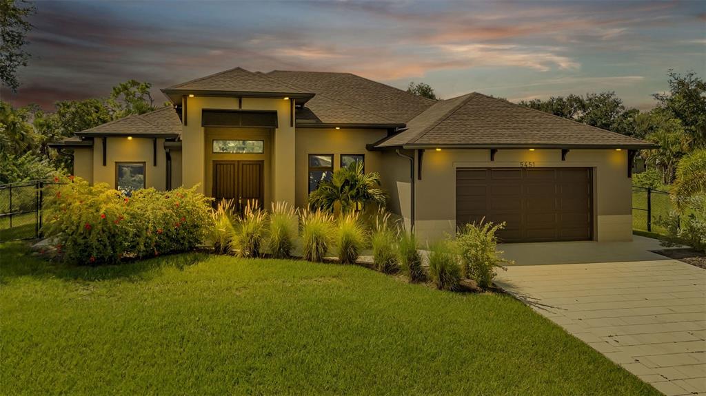 front view of house with a yard