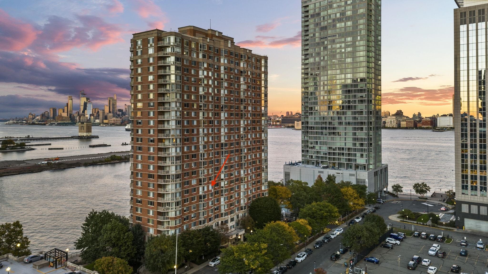 a view of a city with tall buildings