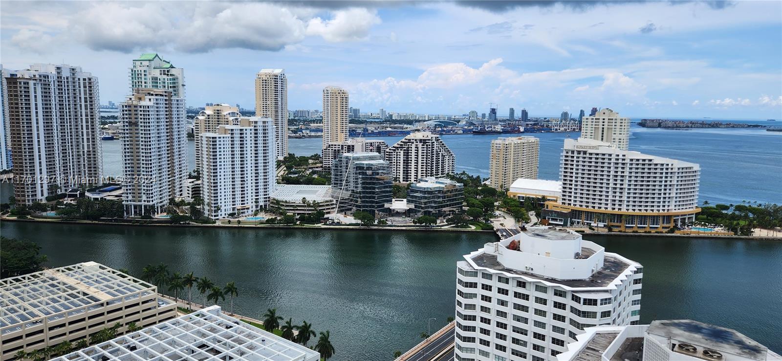 a view of a city with tall buildings