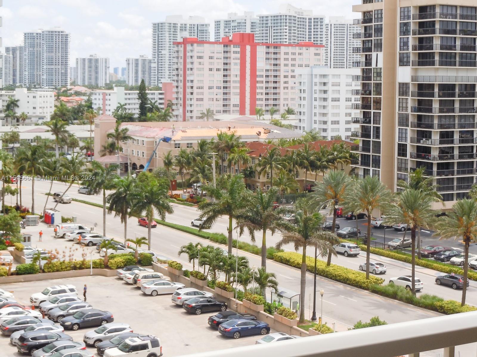 a view of city with tall buildings