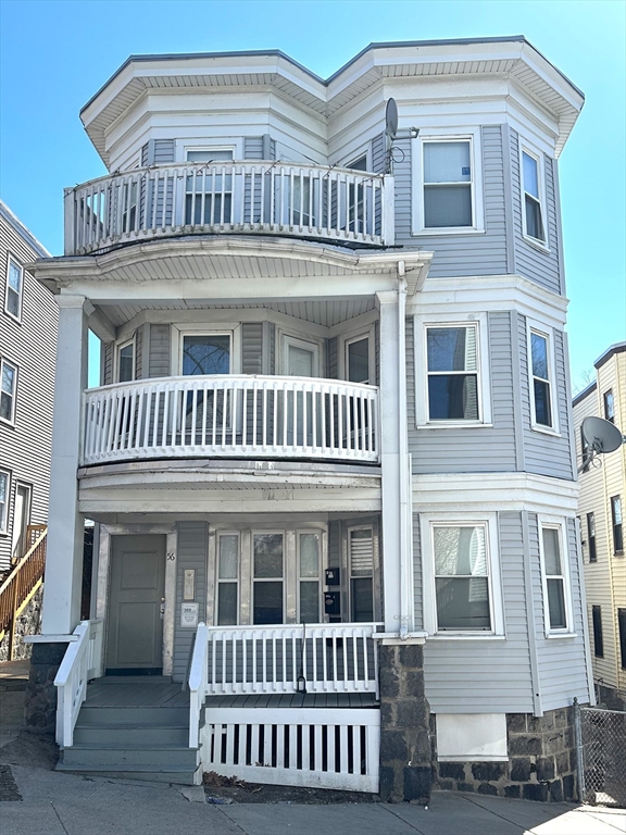 a view of a building with a deck